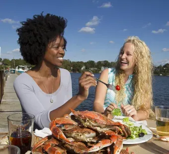 Women enjoying crabs