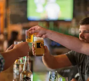 RAR Brewing Friends Toasting