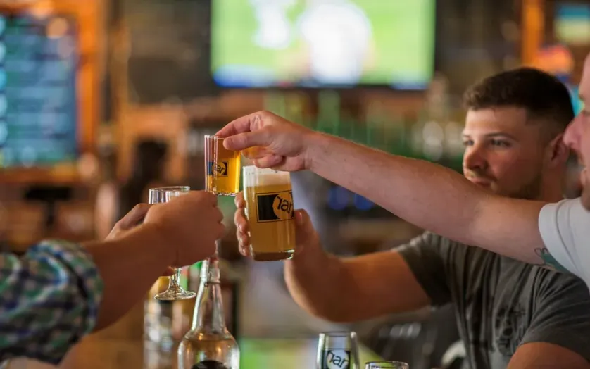 RAR Brewing Friends Toasting